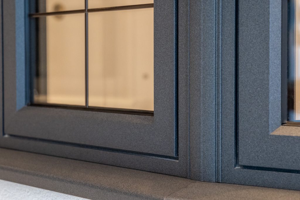 close up of textured aluminium painted window