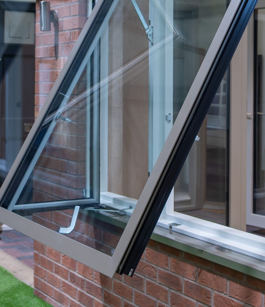 close up of aluminium and wood hybrid sash window