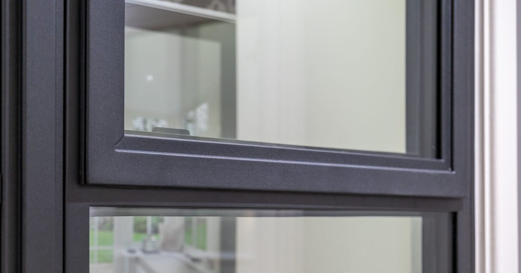 close up of slimline aluminium window frame for Choosing the Right Window Material for Your Home article